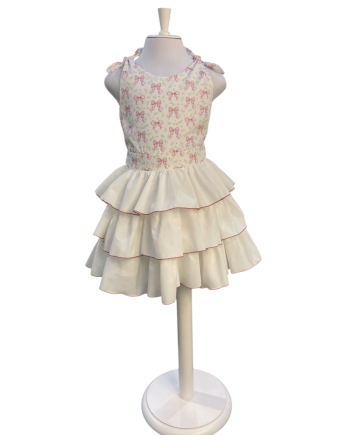 VESTIDO CORTE BAJO FALDA EN CAPAS ESTAMP LAZOS